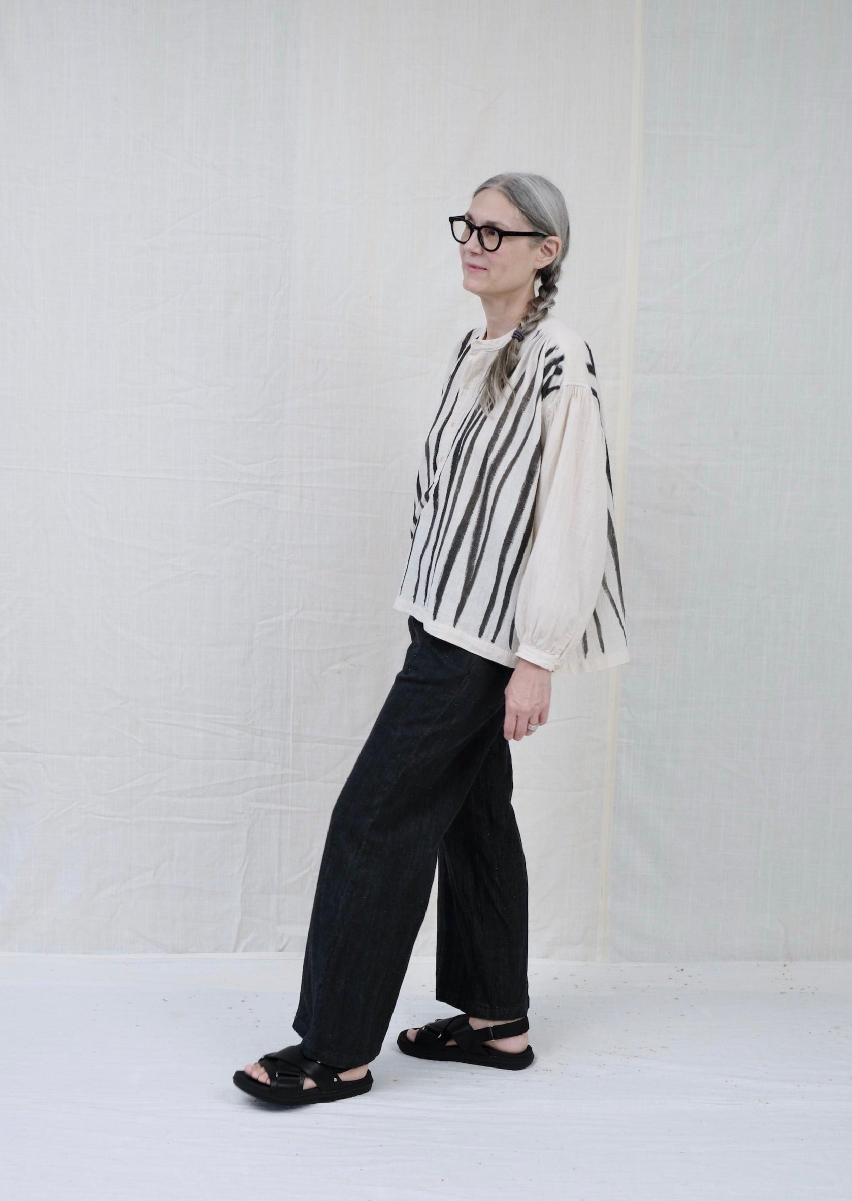 black khadi denim long sailor pant on model side view