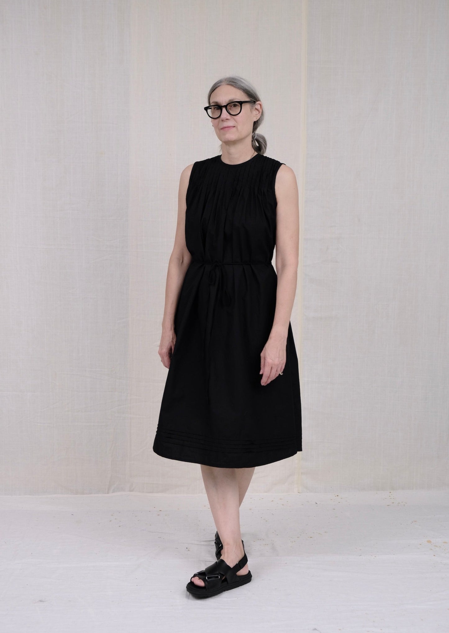pintuck dress black poplin on model