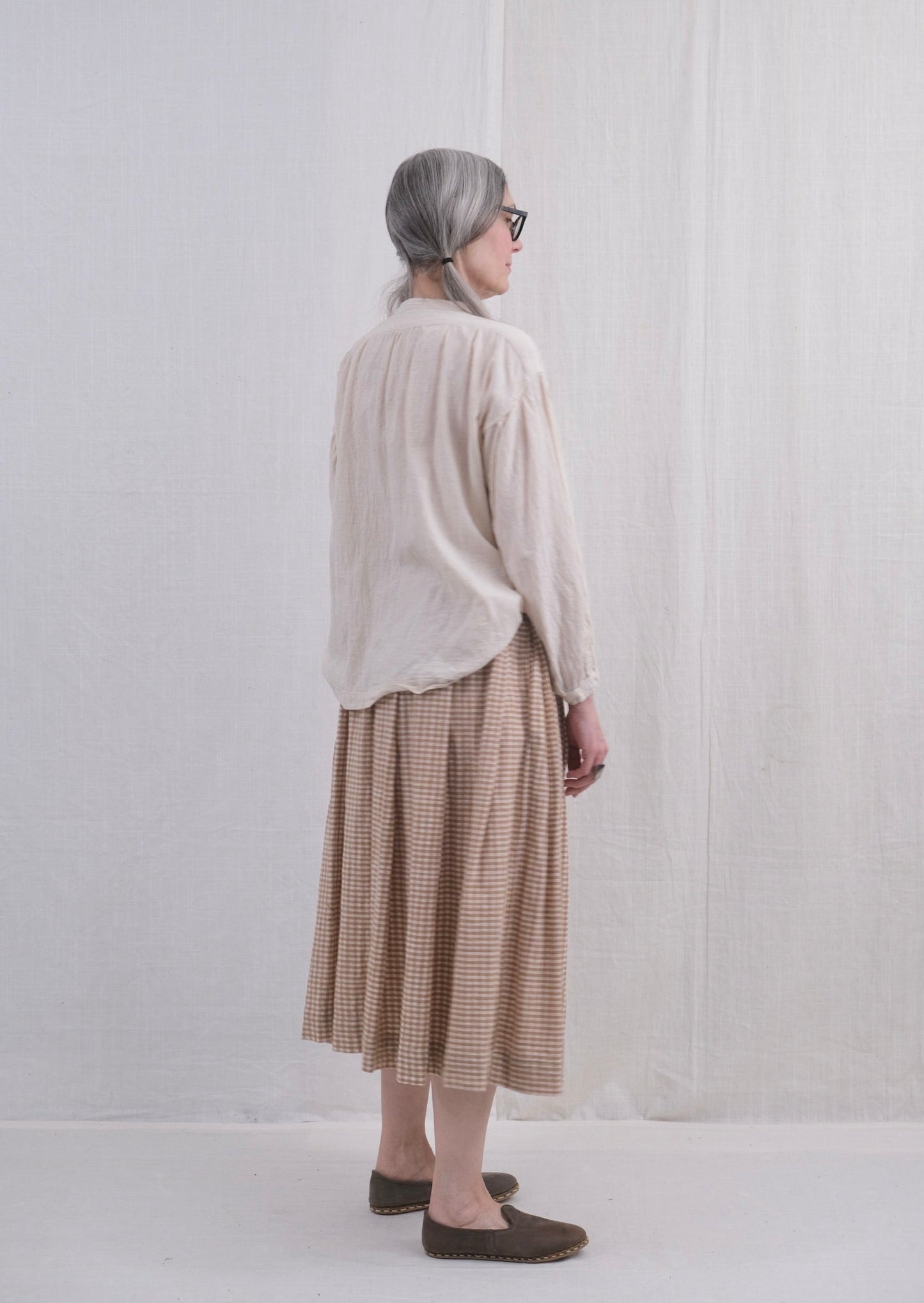 Belle Skirt, brown ginham on model back view