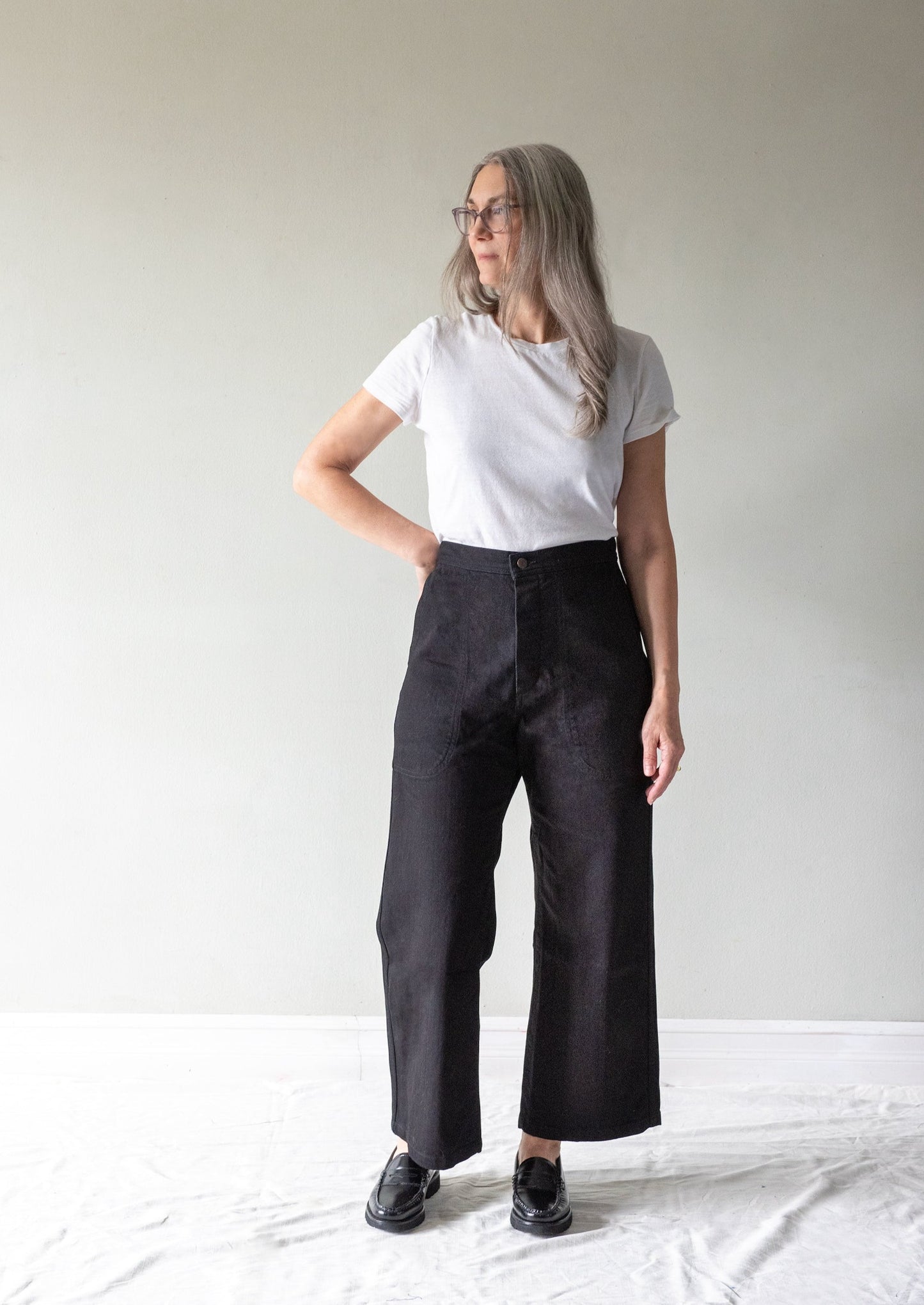 MODEL IN BLACK DENIM SAILOR PANT