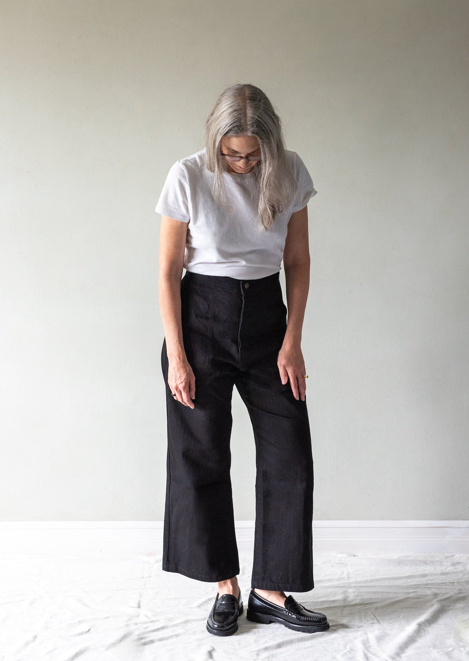 MODEL IN BLACK DENIM SAILOR PANT