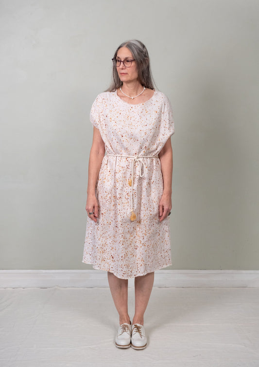 belted paint-splatter sack dress front view