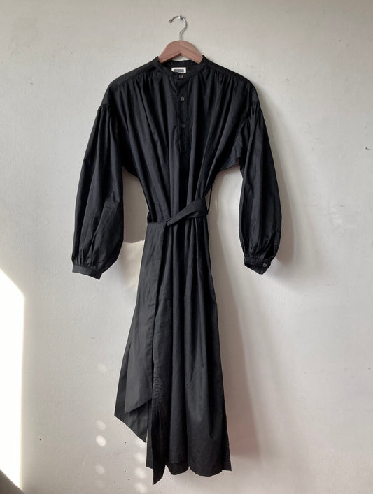 black belted dress on a hanger
