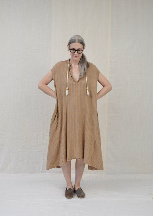 sleeveless dervish dress natural brown stripe organic cotton on model