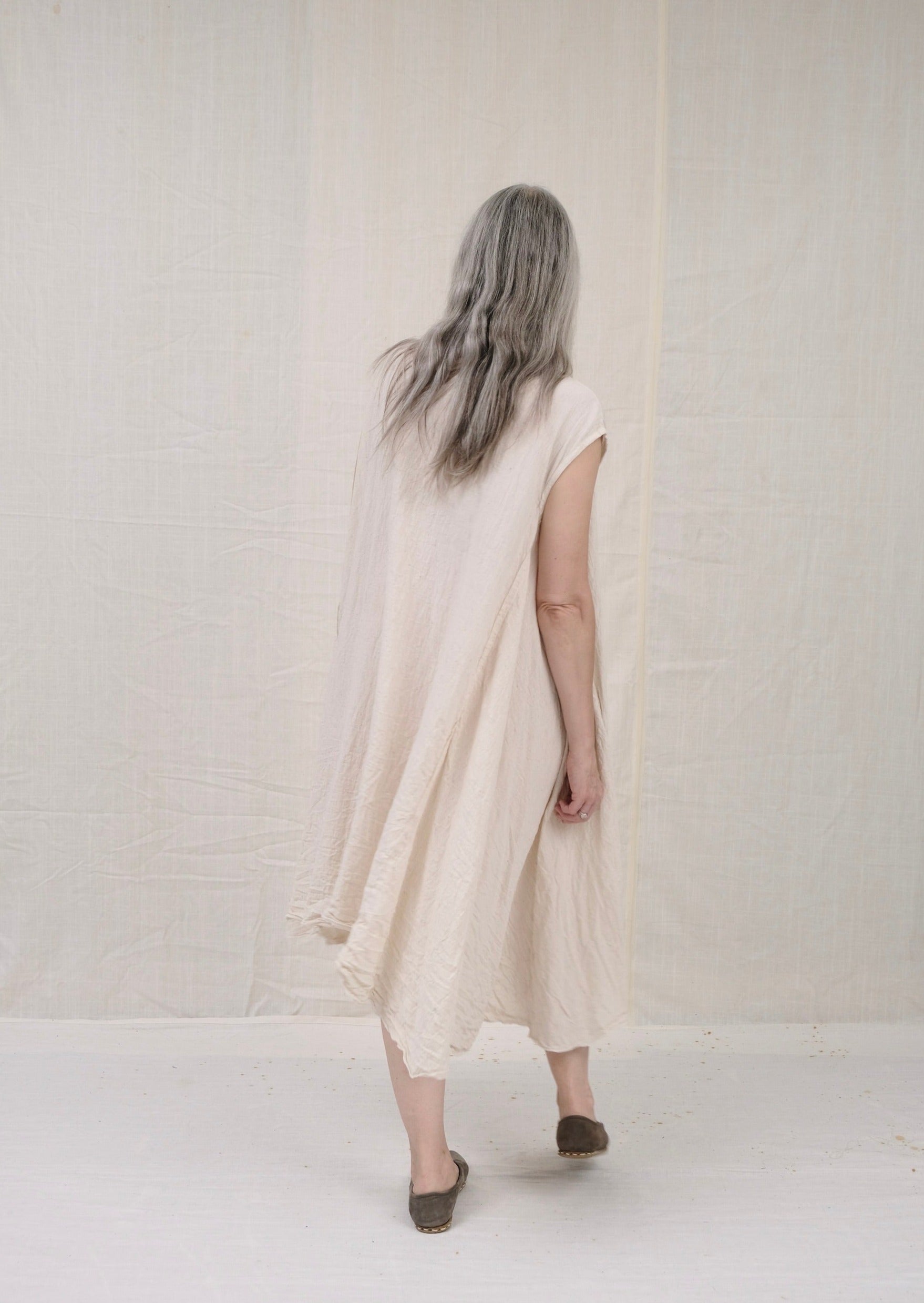 sleeveless dervish dress natural khadi cotton  on model back view