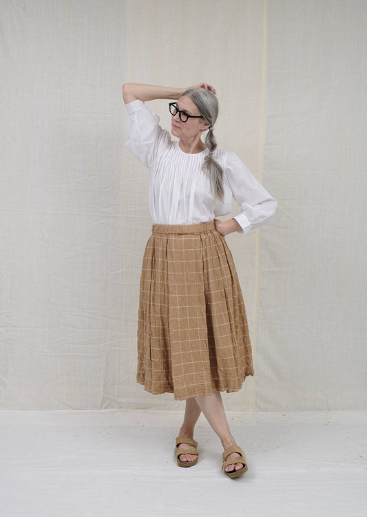 Brown Windowpane pleated full Belle Skirt on model