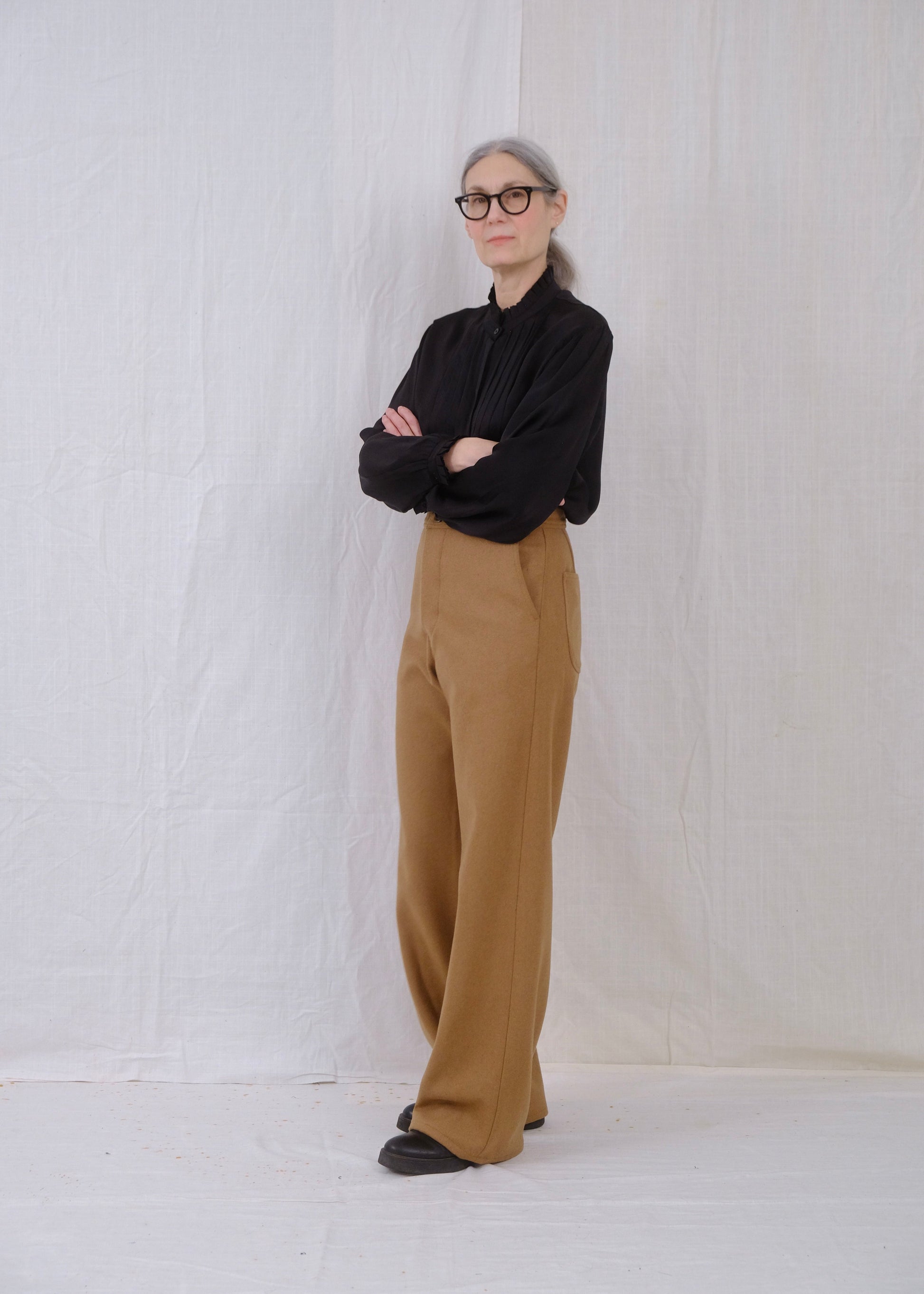 camel wool long sailor with black ruffle blouse